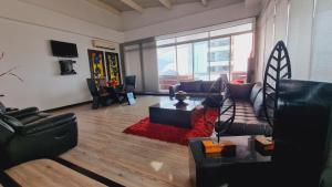 Istumisnurk majutusasutuses Habitat Suites Hotel By GHO Hoteles