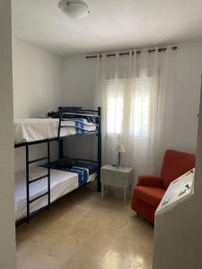 Postel nebo postele na pokoji v ubytování Apartamento Green Golf Islantilla + 30 fotografií