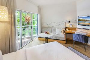 Shangri-La The Marina, Cairns客房内的一张或多张床位