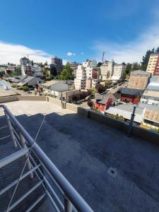 a view of a city from the roof of a building at 4 Soles in San Carlos de Bariloche