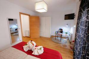 Postel nebo postele na pokoji v ubytování APARTAMENTOS ARGIA 2
