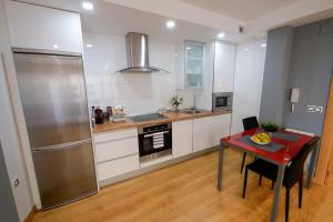 Kuchyň nebo kuchyňský kout v ubytování APARTAMENTOS ARGIA 2
