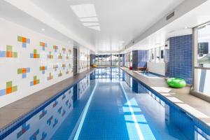 The swimming pool at or close to Meriton Suites Herschel Street, Brisbane