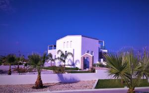 Fotografia z galérie ubytovania Xenos Villa 4 - Luxury Villa With Private Swimming Pool Near The Sea v destinácii Tigaki