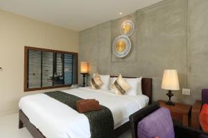 Tea Tree Boutique Resort客房内的一张或多张床位