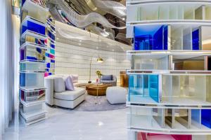 Posezení v ubytování Kuanrong Suites Hotel Liangjiang love sea shopping park