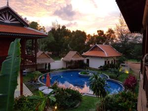 The swimming pool at or close to Sunbird Garden Resort