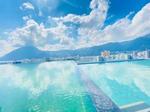 The swimming pool at or close to AMANEK Inn Beppu