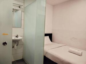 Postel nebo postele na pokoji v ubytování 7 Hotel
