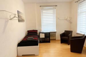 Posezení v ubytování 3 Zimmerwohnung mit Garten