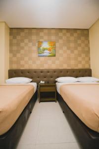 Postel nebo postele na pokoji v ubytování Hotel 801