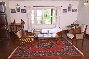 Foto da galeria de Tumsong Tea Retreat em Darjeeling