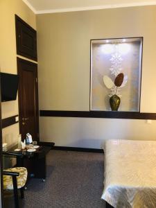 Posteľ alebo postele v izbe v ubytovaní Classic Hotel