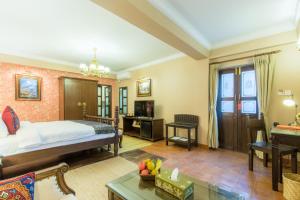 Voodi või voodid majutusasutuse Baber Mahal Vilas - The Heritage Hotel toas
