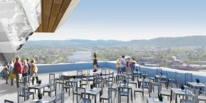 Aussicht von der Spitze eines Gebäudes mit Stühlen und Personen in der Unterkunft Clarion Collection Hotel Kongsberg in Kongsberg