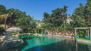 Amnaya Resort Nusa Dua内部或周边的泳池