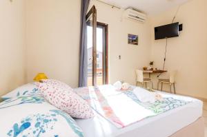 Posteľ alebo postele v izbe v ubytovaní Guesthouse Somnium