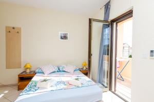 Posteľ alebo postele v izbe v ubytovaní Guesthouse Somnium