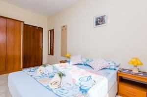 Posteľ alebo postele v izbe v ubytovaní Guesthouse Somnium