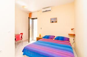 Posteľ alebo postele v izbe v ubytovaní Guesthouse Somnium