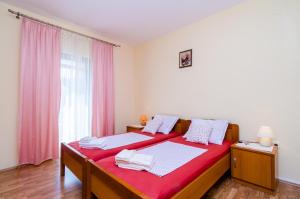 Posteľ alebo postele v izbe v ubytovaní Guesthouse Somnium