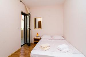 Posteľ alebo postele v izbe v ubytovaní Guesthouse Somnium