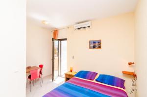 Posteľ alebo postele v izbe v ubytovaní Guesthouse Somnium