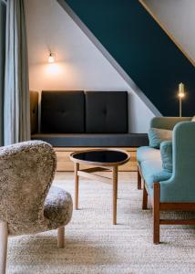 TV a/nebo společenská místnost v ubytování Feldberg Atelier - Courtyard Maisonette
