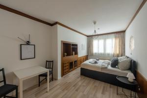 Posteľ alebo postele v izbe v ubytovaní Wohhhlfühl Appartement im Zentrum Graz