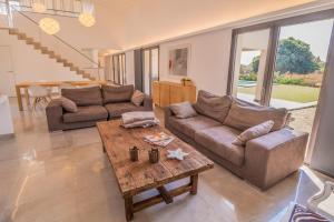 Część wypoczynkowa w obiekcie Finca CAN LLORENC by Mallorca Villa Selection