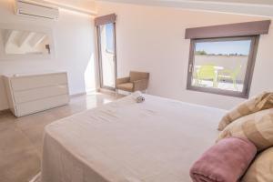 Łóżko lub łóżka w pokoju w obiekcie Finca CAN LLORENC by Mallorca Villa Selection
