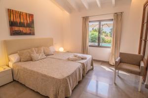 Postel nebo postele na pokoji v ubytování Finca CAN LLORENC by Mallorca Villa Selection + 30 fotografií