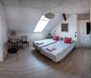 Postel nebo postele na pokoji v ubytování Louiselund Bed & Breakfast