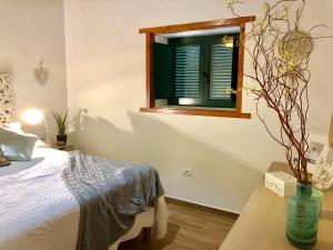 A bed or beds in a room at Finca Los Llanitos