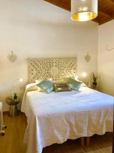 Postel nebo postele na pokoji v ubytování Finca Los Llanitos