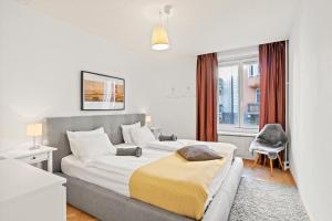 Postel nebo postele na pokoji v ubytování Modern & Central Apartments