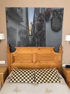 Postel nebo postele na pokoji v ubytování Maximiano Herculeo