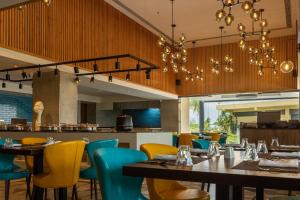 Amika Hotel,Madurai - Near Airport 레스토랑 또는 맛집