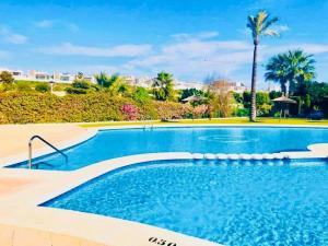 Bazén v ubytovaní Casa Beth Villamartin 2 Bedroom/ 2 Bathroom with Pool alebo v jeho blízkosti