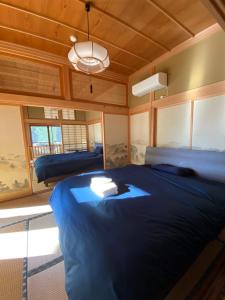Ліжко або ліжка в номері 1日1組限定-伊那谷別邸-share old folk house-