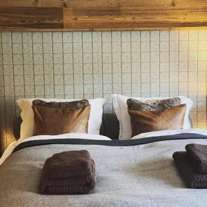 Postel nebo postele na pokoji v ubytování Chalet Bull Zermatt