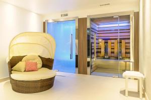 Ein Bett oder Betten in einem Zimmer der Unterkunft Alpenlove - Adult SPA Hotel