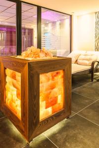 Ein Bett oder Betten in einem Zimmer der Unterkunft Alpenlove - Adult SPA Hotel