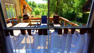 a view of a patio with chairs and a fireplace at Hof Stallegg in Löffingen