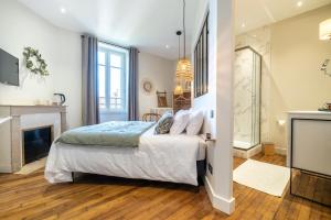 Edouard & Louise - Chambres d'hôtes客房内的一张或多张床位