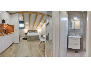 Kuchyňa alebo kuchynka v ubytovaní Apartments Sweet Escape