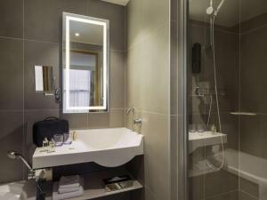 Um banheiro em Novotel Genève Centre
