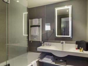 Um banheiro em Novotel Genève Centre