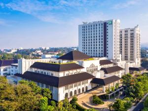 an aerial view of a large building in a city at ibis Styles Bandung Grand Central in Bandung