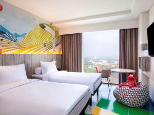 Letto o letti in una camera di ibis Styles Bandung Grand Central